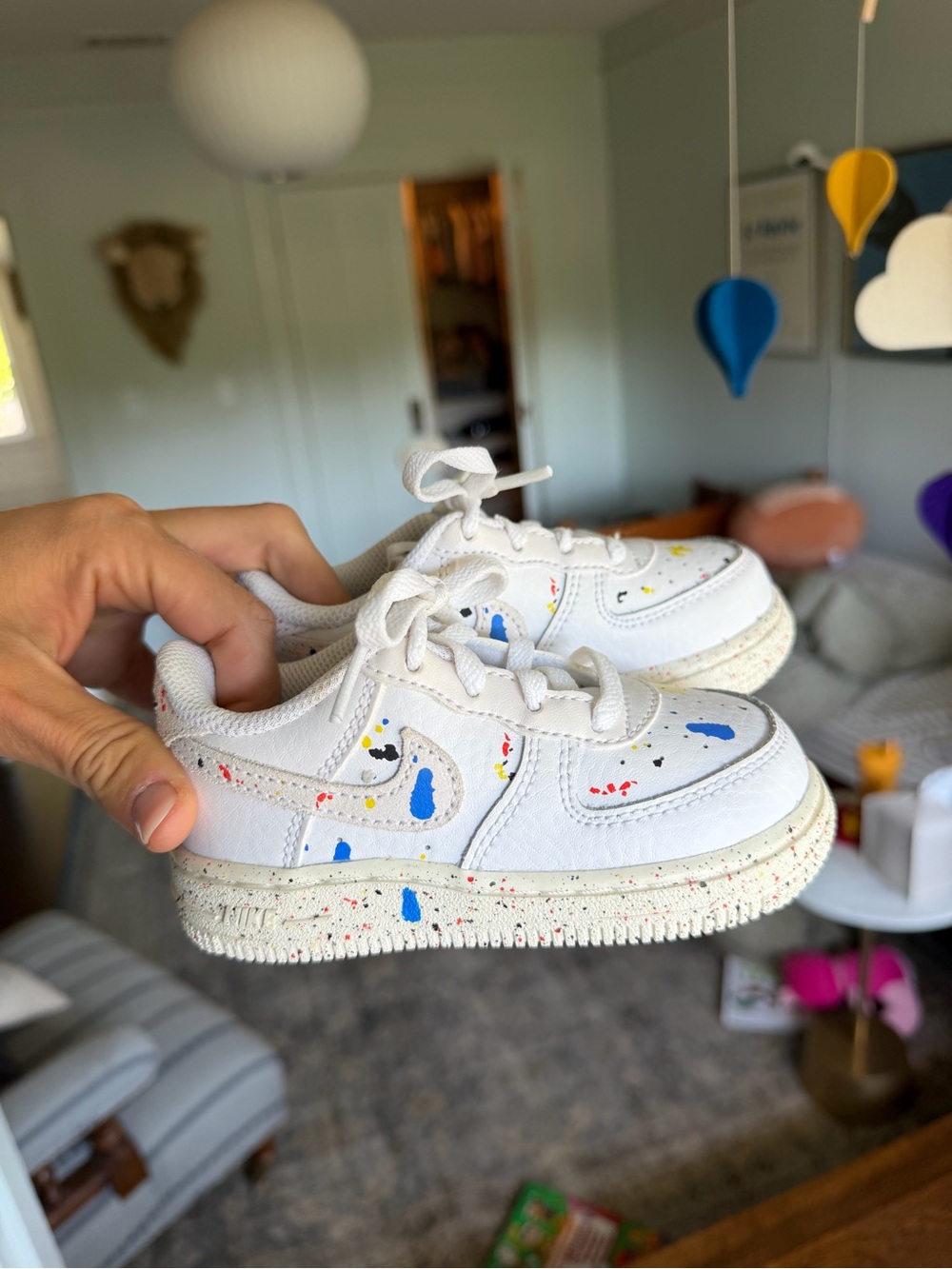 Nike Kids White Sneakers with Blue, Red & Yellow Paint Accents